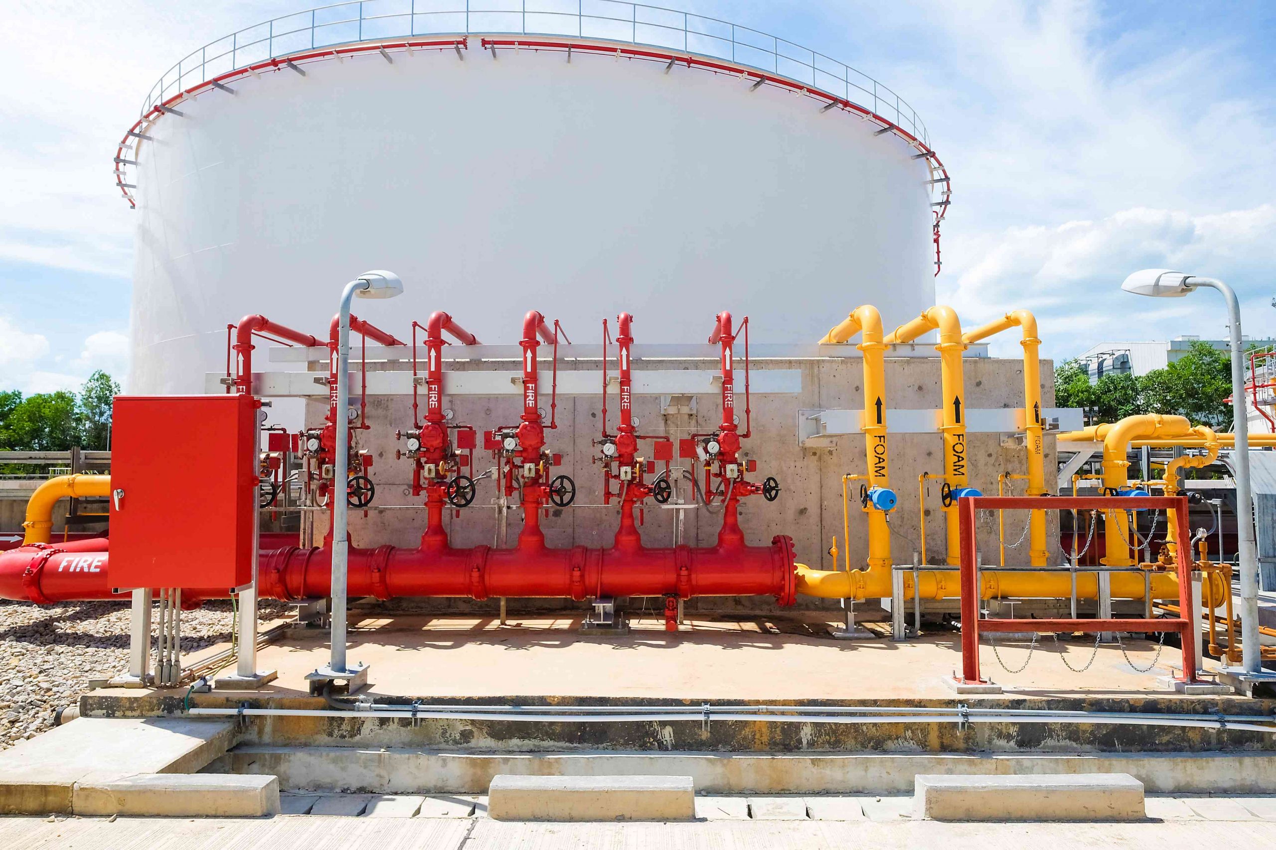 Image of industrial storage tank with fire protection system