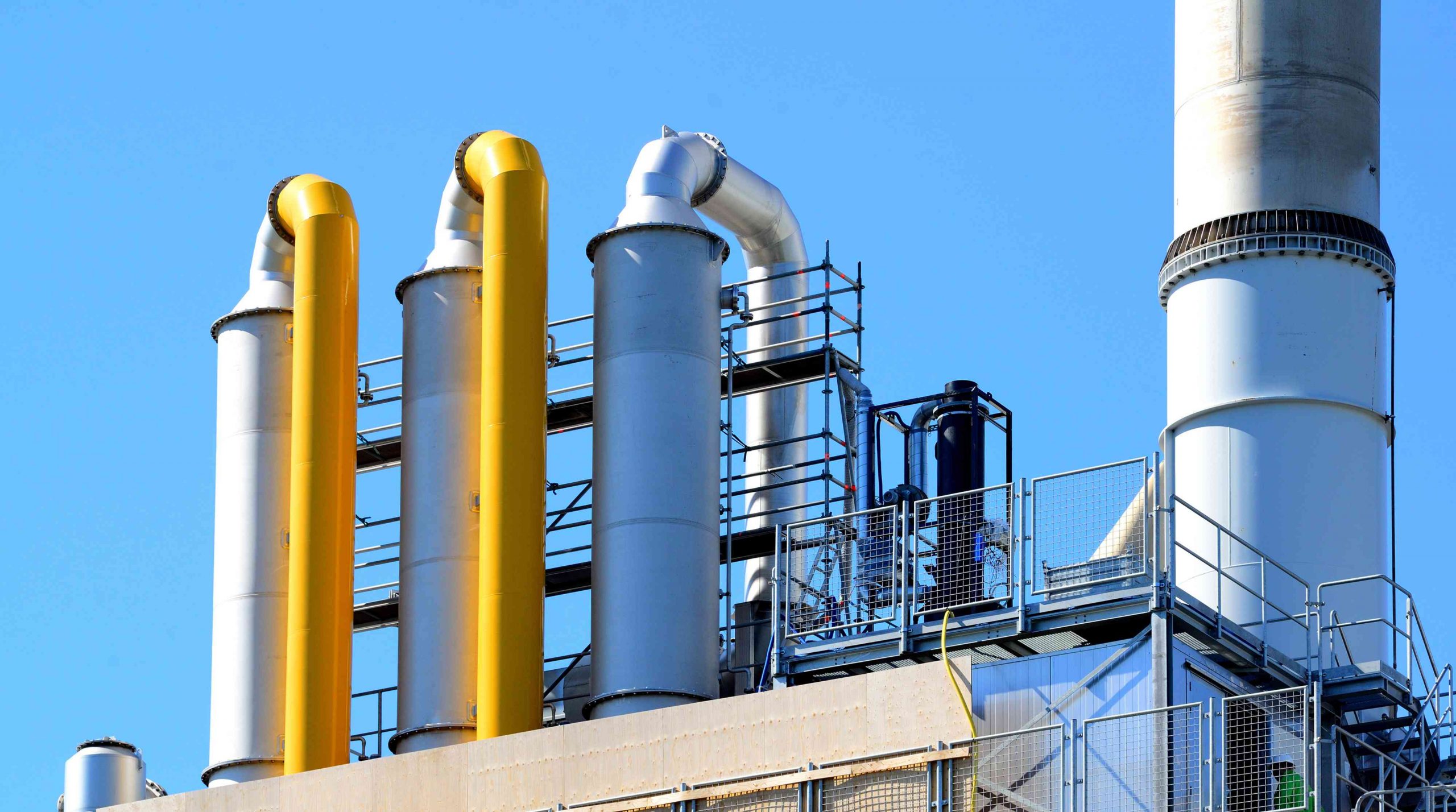 : Industrial equipment to scrub pollutants from process gasses at processing plants. Packed bed distribution towers.