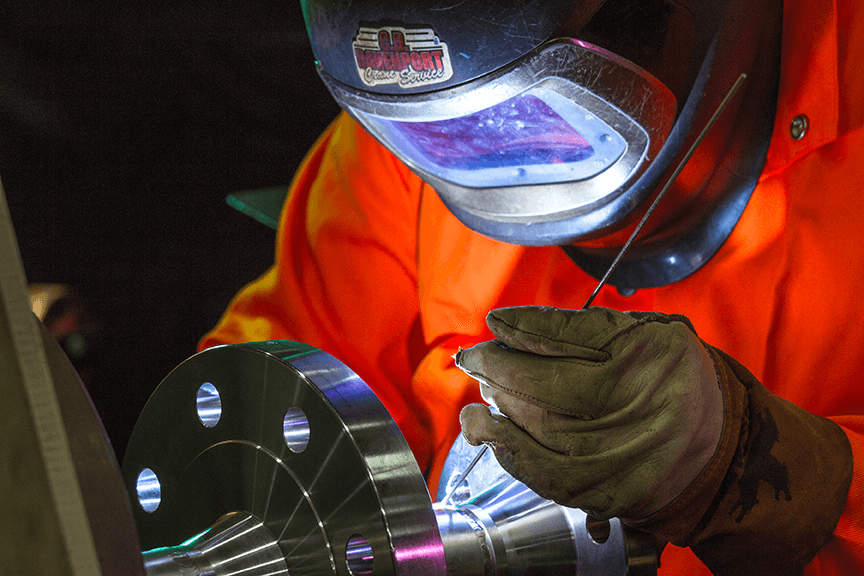 Detail of BETE welder working